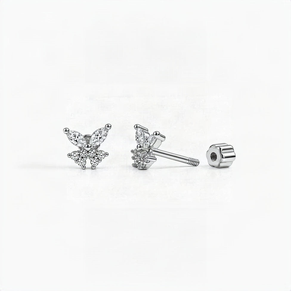 Silver butterfly stud earrings with marquise and round-cut clear gemstones, shown from multiple angles including a separate butterfly back, on a white background.